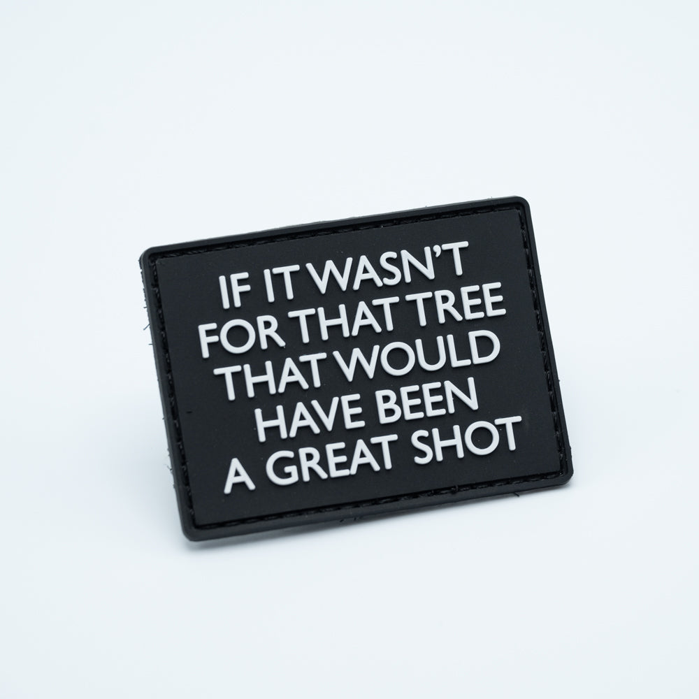 Discgolf patch in PVC with the text If It Wasnt for that Tree That Would Have Been A Great Shot