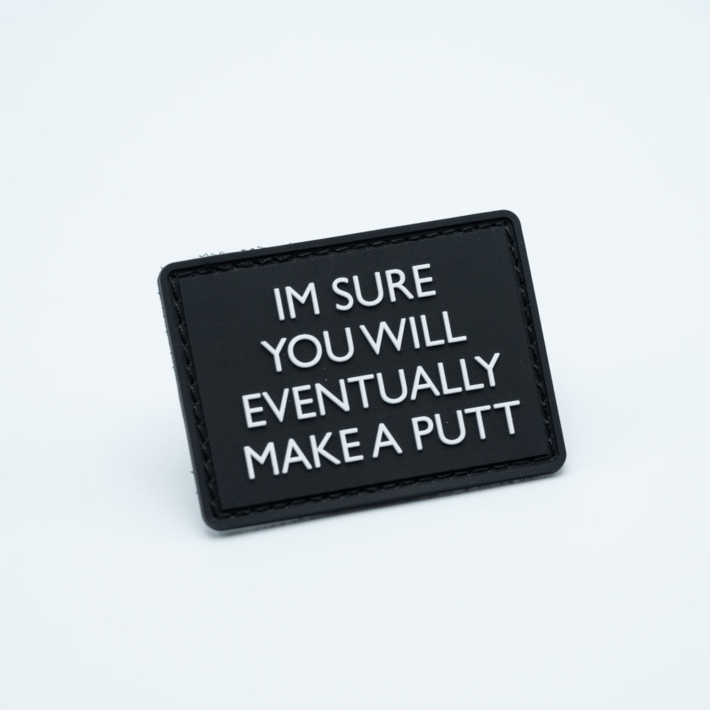 Discgolf patch in pvc with the text Im Sure you will eventually make a put