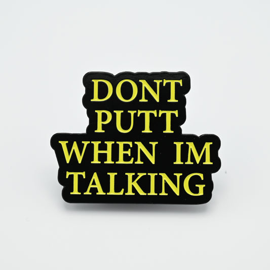 Discgolf pin with the text Dont putt when im talking