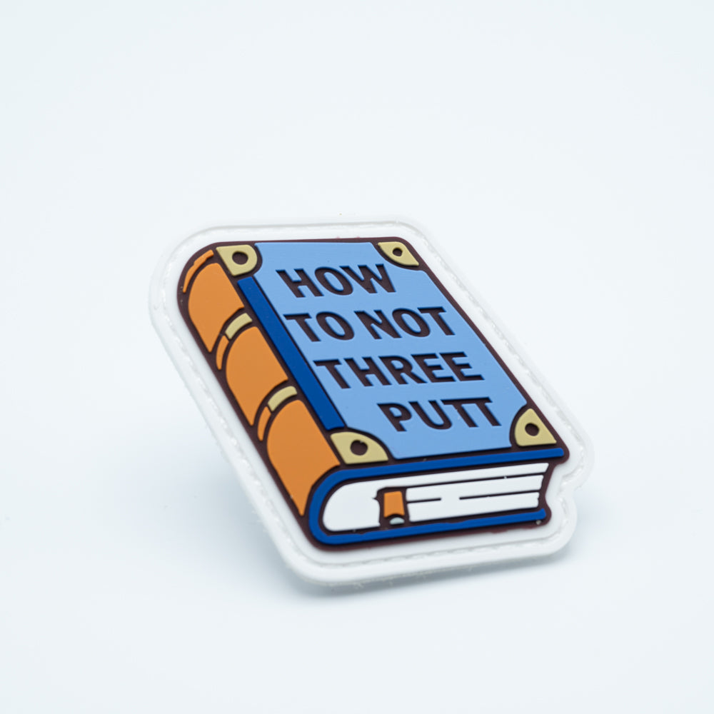 A Discgolf PVC with a book and the text How to not three putt on the book