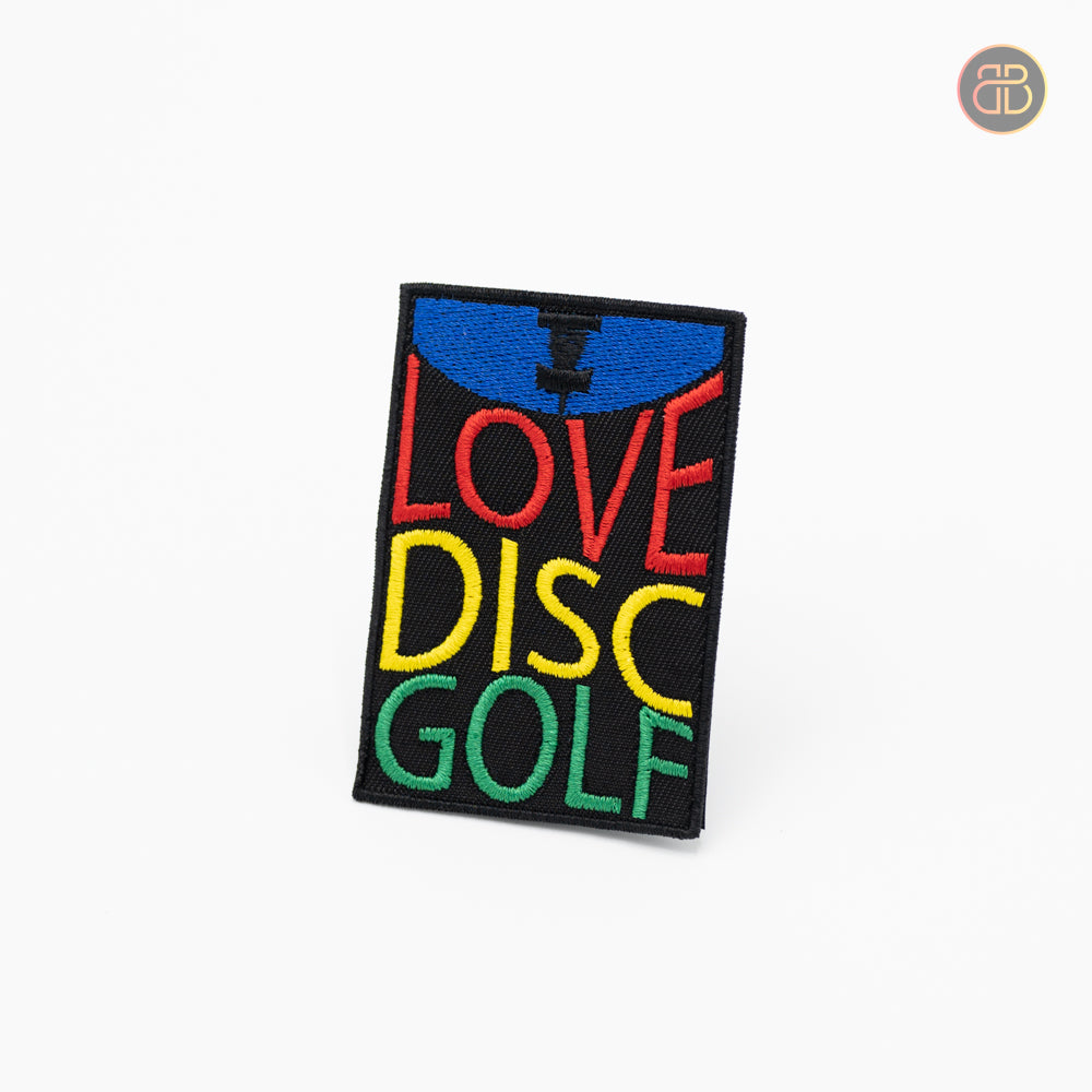 Discgolf patch with a basket in top then the words Love Disc Golf