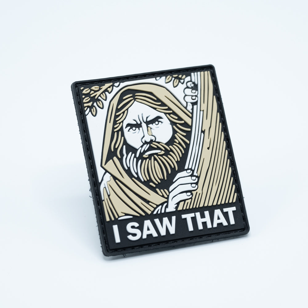 Discgolf patch in PVC with a jesus lookalike standing behind a tree and the text I Saw that