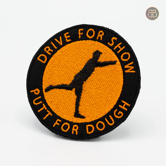 Discgolf patch with a player throwing a discgolf disc and the text Drive For Show Putt For Dough